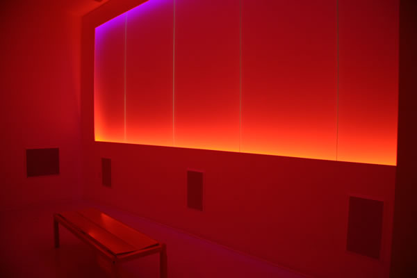 The Place Where You Go to Listen illuminated in red light