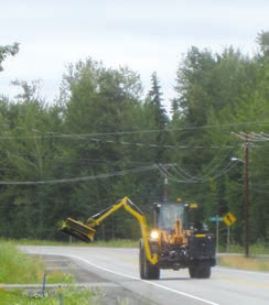 Mower driving on a road