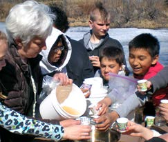 Students sharing birch syrup