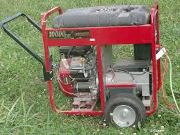 Red generator in a field of grass