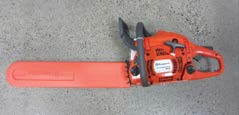 Red Chainsaw on the ground