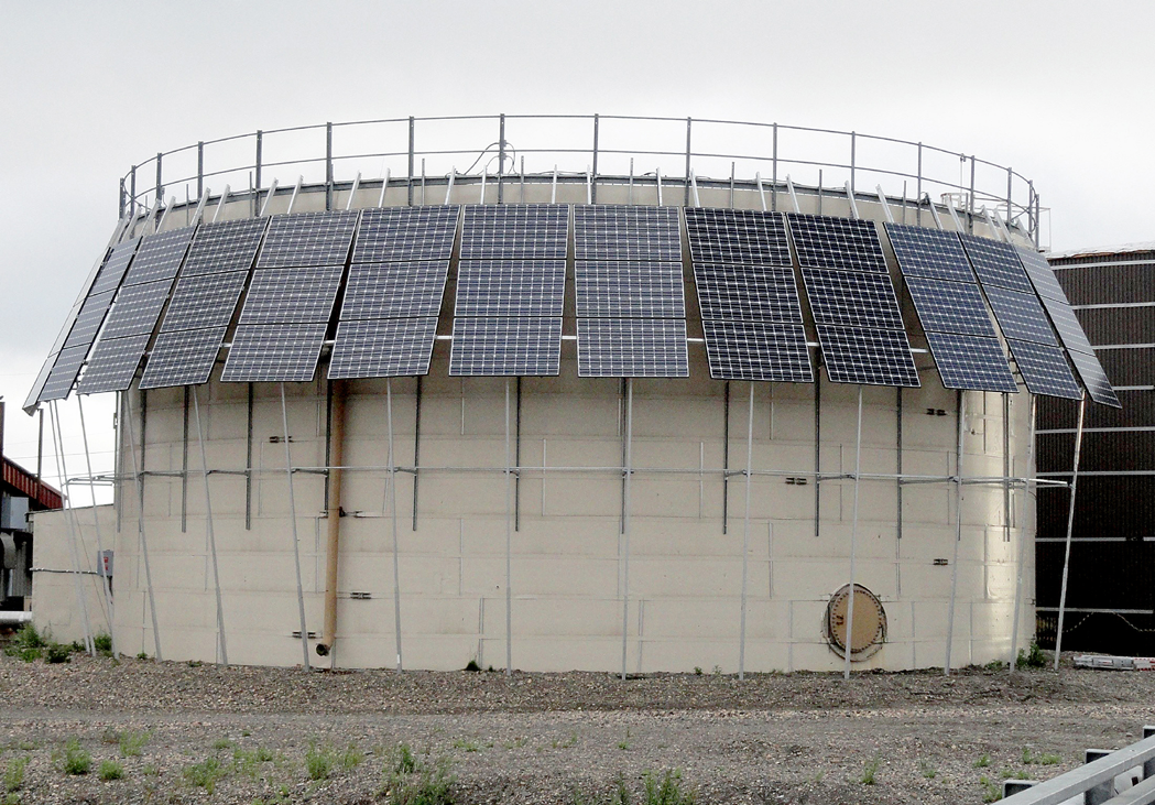 The circular PV array mounted on the water tank in Deering, Alaska. 