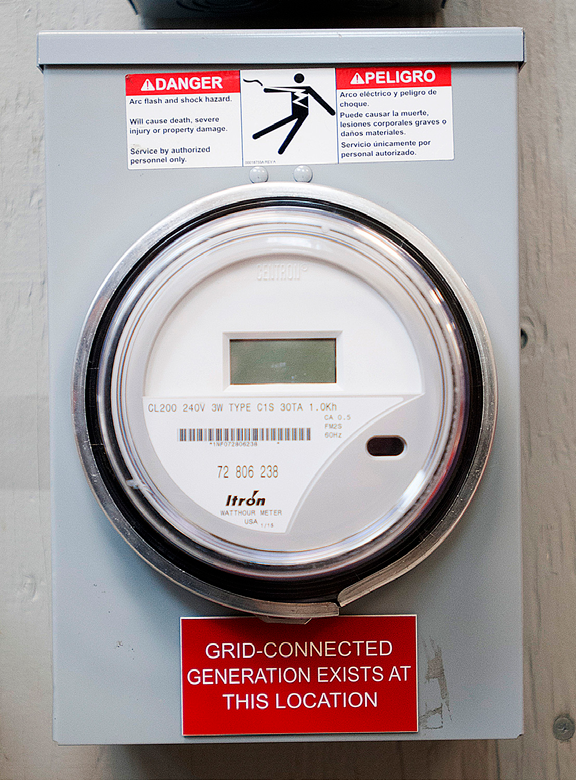 A typical kWh meter provided by the electric utility.