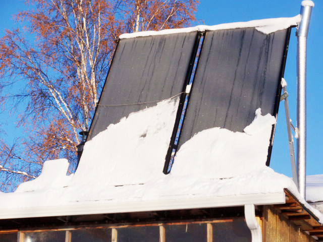 This photo shows the effects of the snow that is shed from the panel