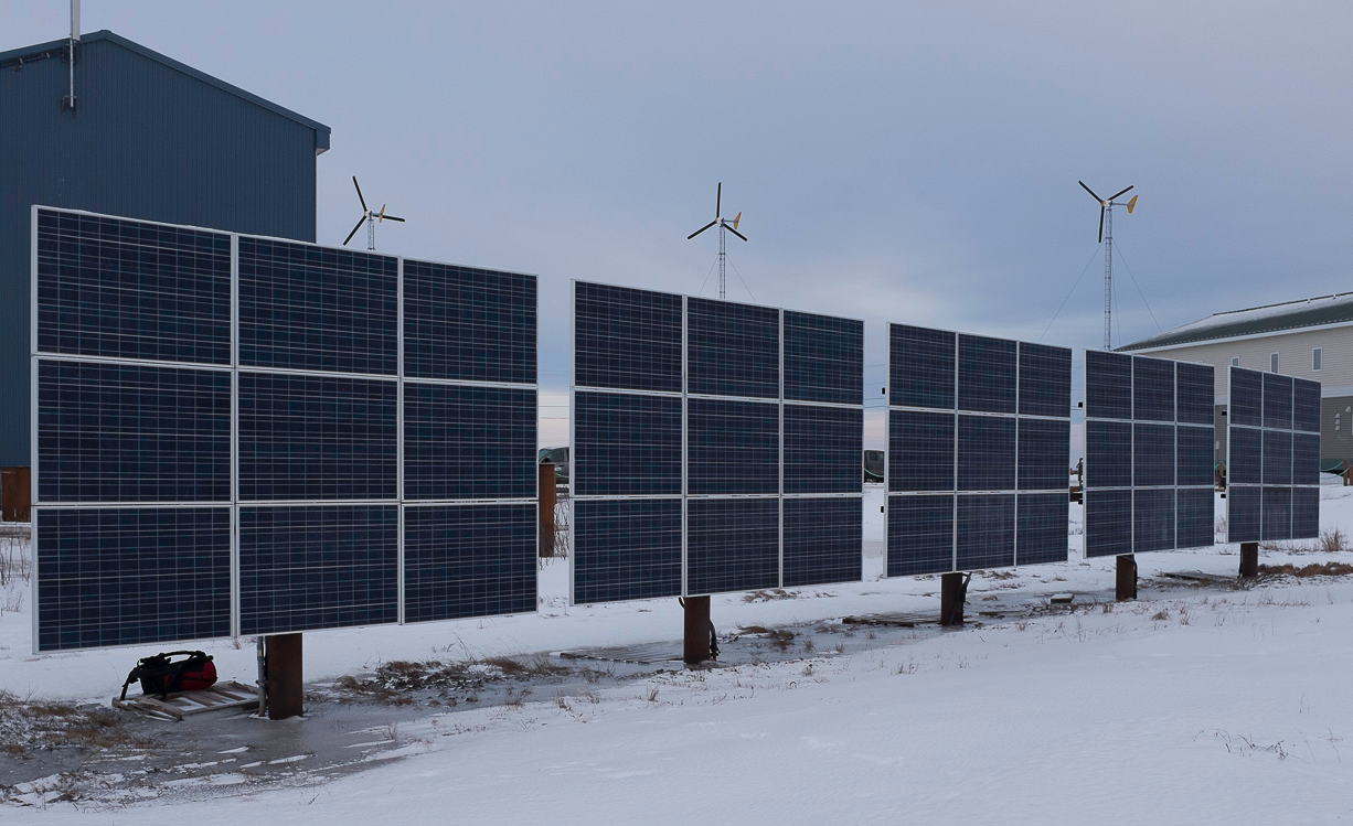 These pole-mounted PV arrays (left) located in Bethel are mounted on 8-inch pilings.