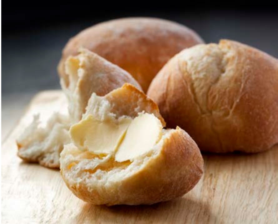 Several bread rolls on a table