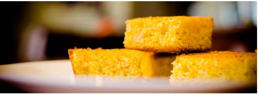 Cornbread stacked on a plate