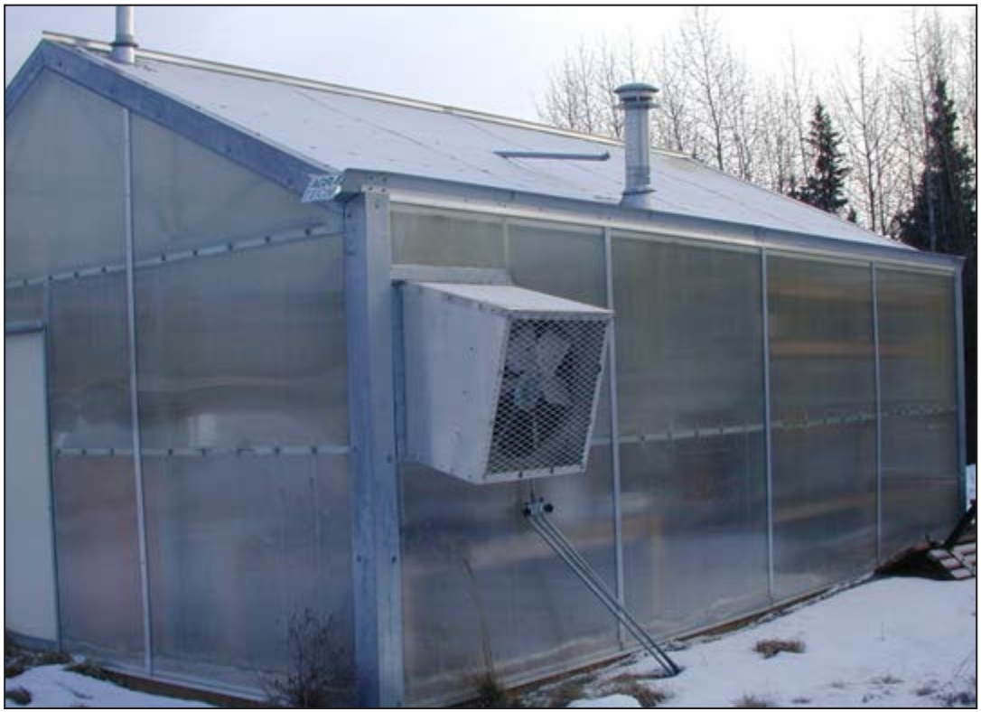 Freestanding greenhouses usually have fans at one end of the house and vents on the other.