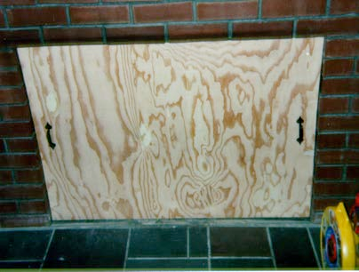 Flat sheet of plywood with handles