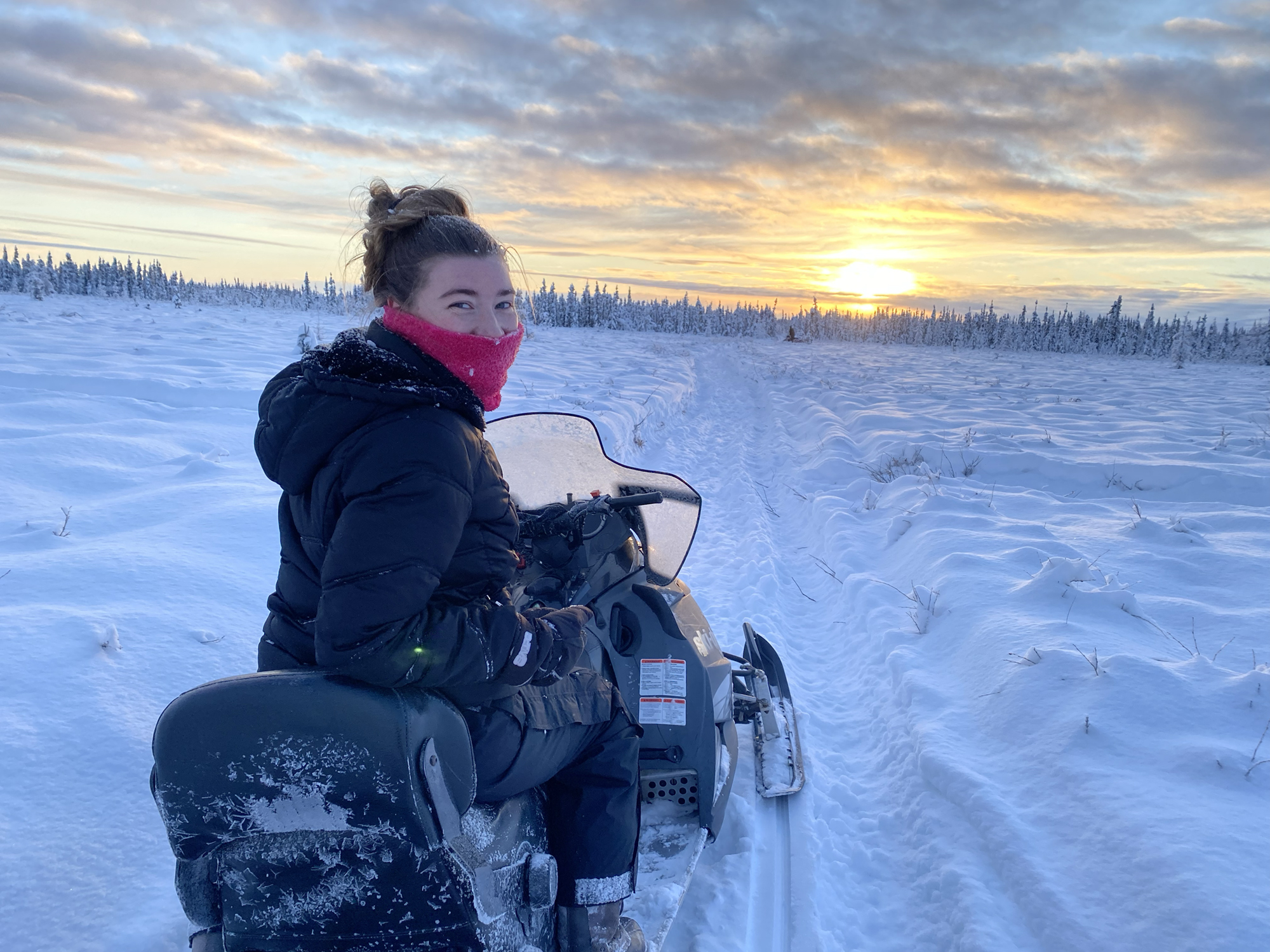 Cadence Conner on a snowmobile. Photo courtesy of Cadence Conner.