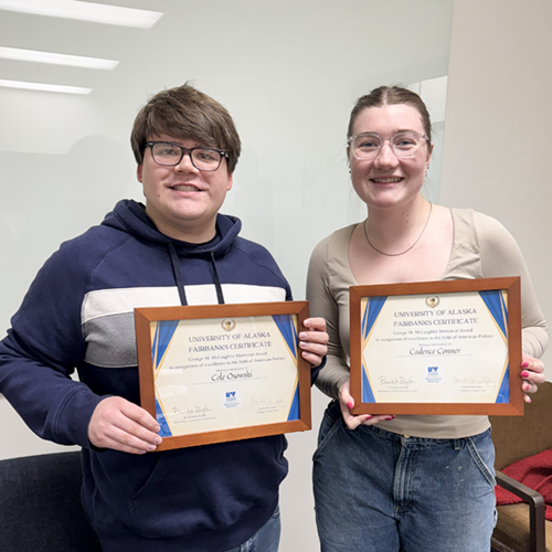 University of Alaska Fairbanks Department of Political Science students Cole Osowksi and Cadence Conner are awarded the McLaughlin Award. UAF Photo by Jamie Bennett