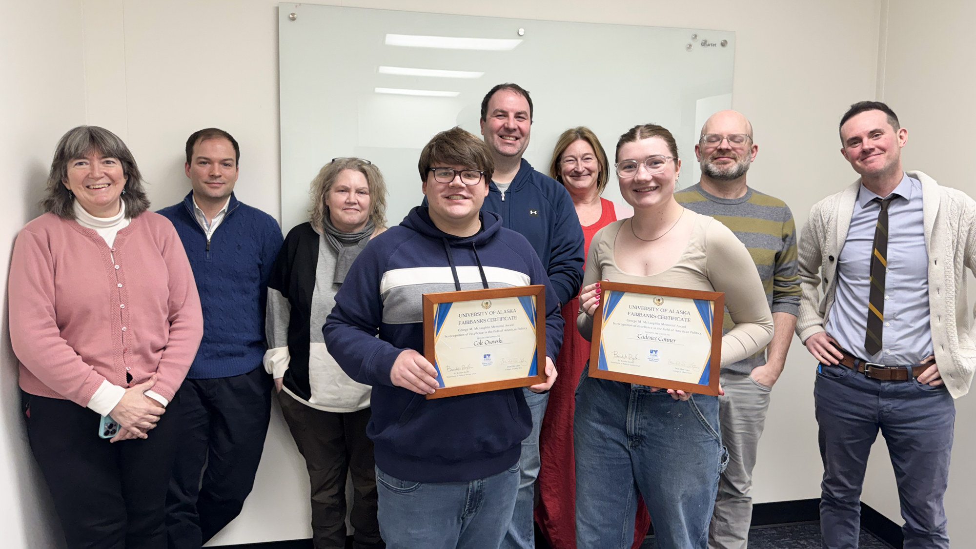 Cadence Conner and Cole Osowski are presented with the McLaughlin Award by UAF Political Science Department faculty on November 15th, 2024. UAF Photo by Jamie Bennett.