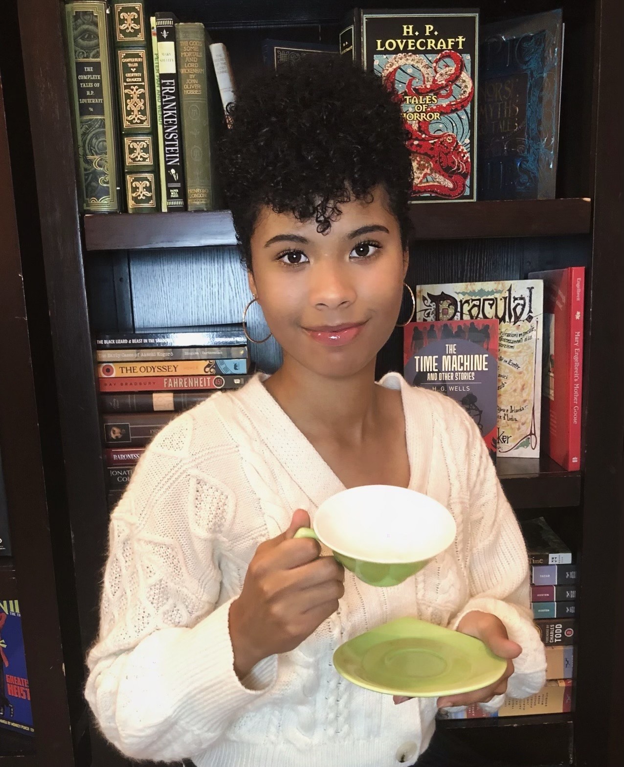 Award recipient Naomi King poses with a tea cup. Image courtesy of King