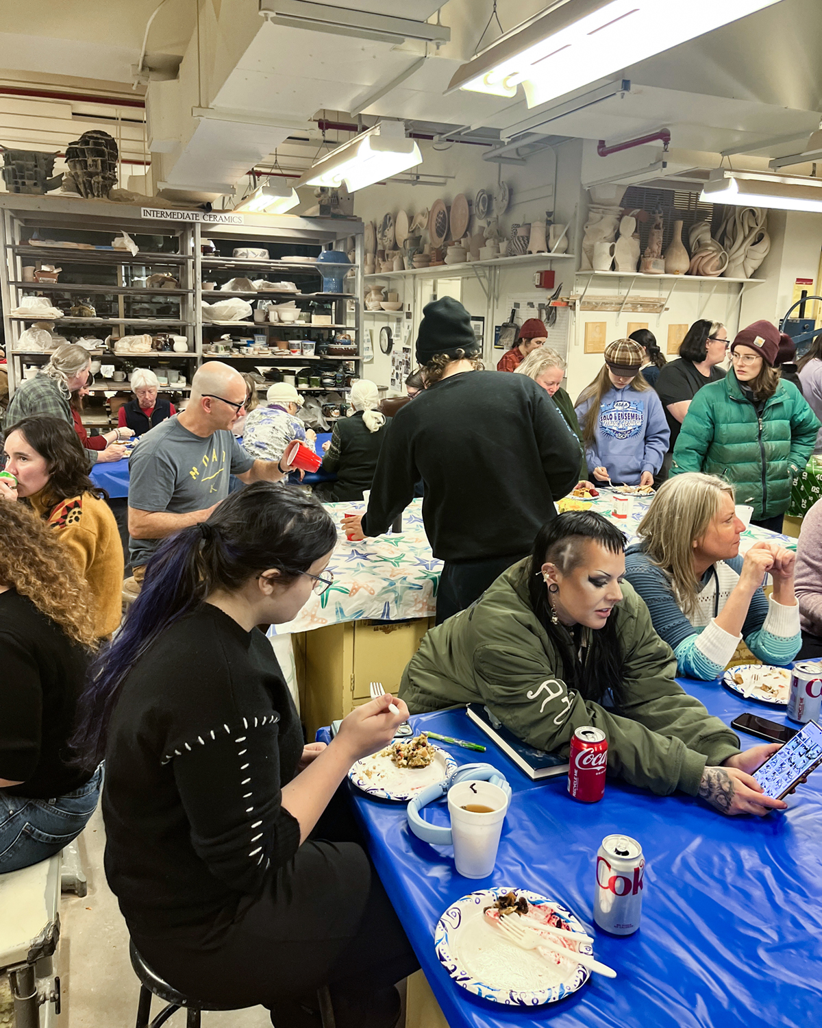 Attendees at the annual SCAG Thanksgiving potluck held in the UAF Ceramics studio. UAF Photo by Abby Druckenmiller