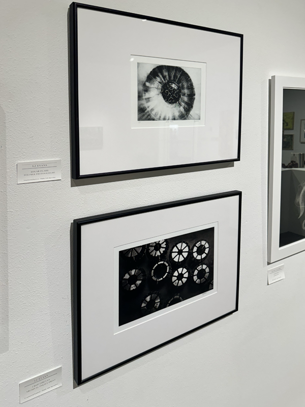 Two black and white abstract photographs by LJ Evans. UAF Photo by Jamie Bennett