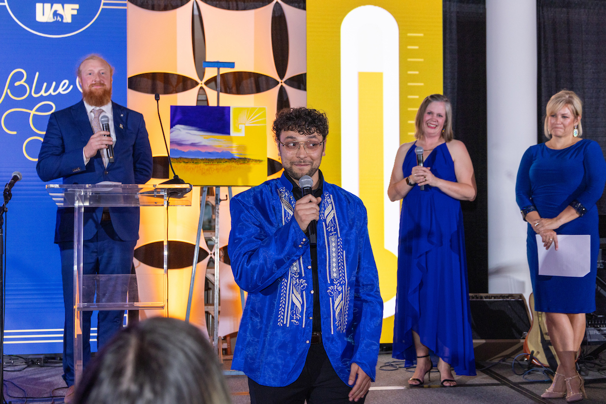 Kyle Agustines speaks at the Blue & Gold Banquet and Fundraising Auction at Dine 49 on the UAF campus Saturday, September 14, 2024. UAF Photo by Eric Engman