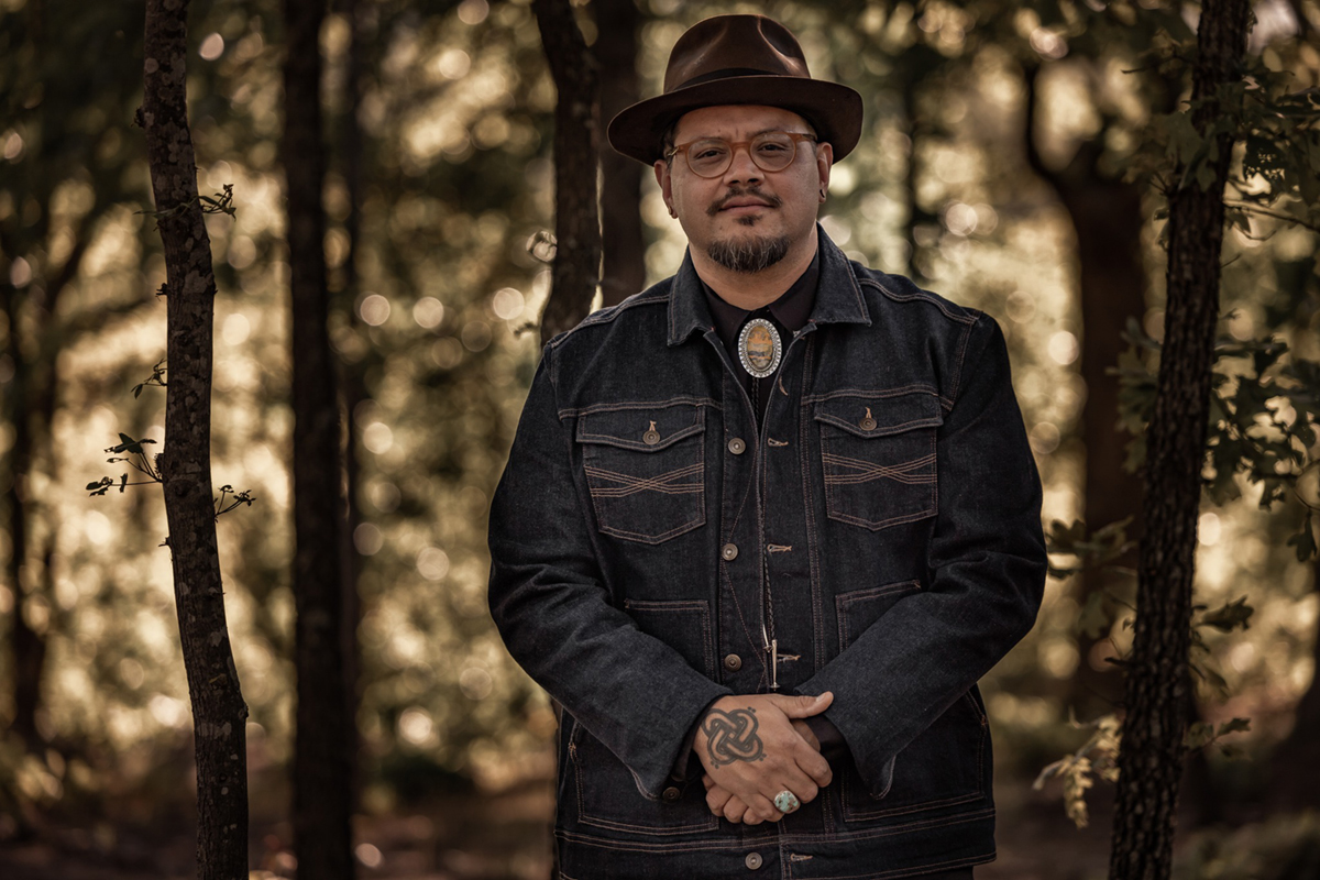 A Seminole man in a jacket and hat faces the camera. Image courtesy of the Sundance Institute