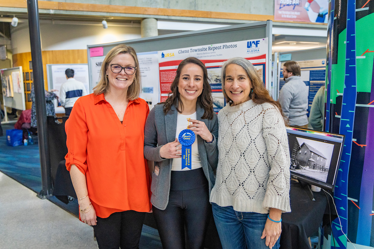 CLA Dean's Choice Awardee Marina Barbosa Santos poses with Dean Ellen Lopez and Associate Dean Carrie Baker. UAF photo by Leif Van Cise