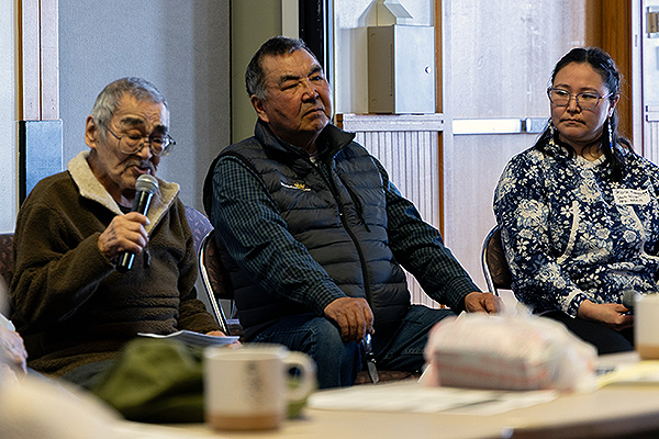 Three Yupik individuals sitting at a conference tableat the Western Alaska science conference in Bethel.