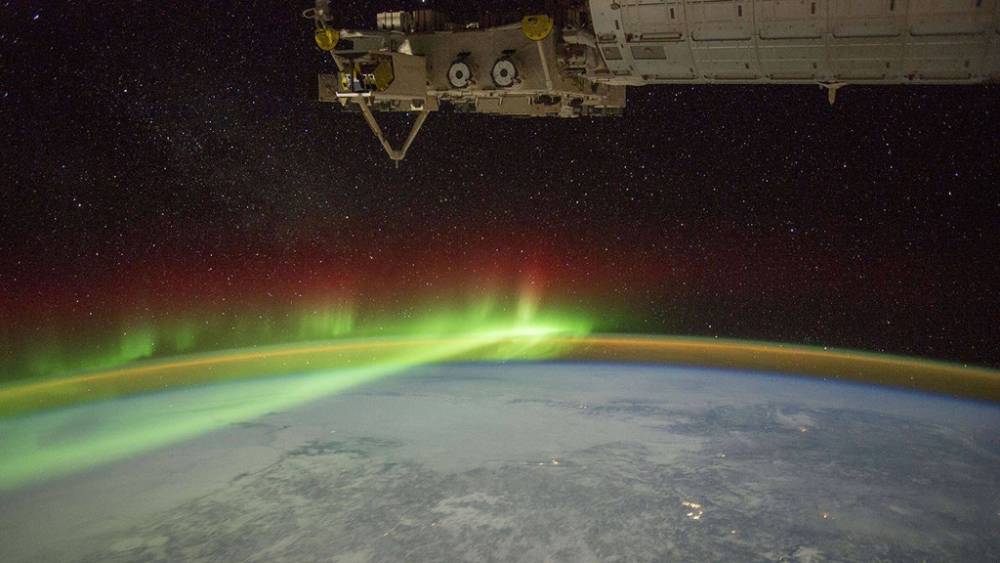 Ionosphere and aurora wrap around earth.