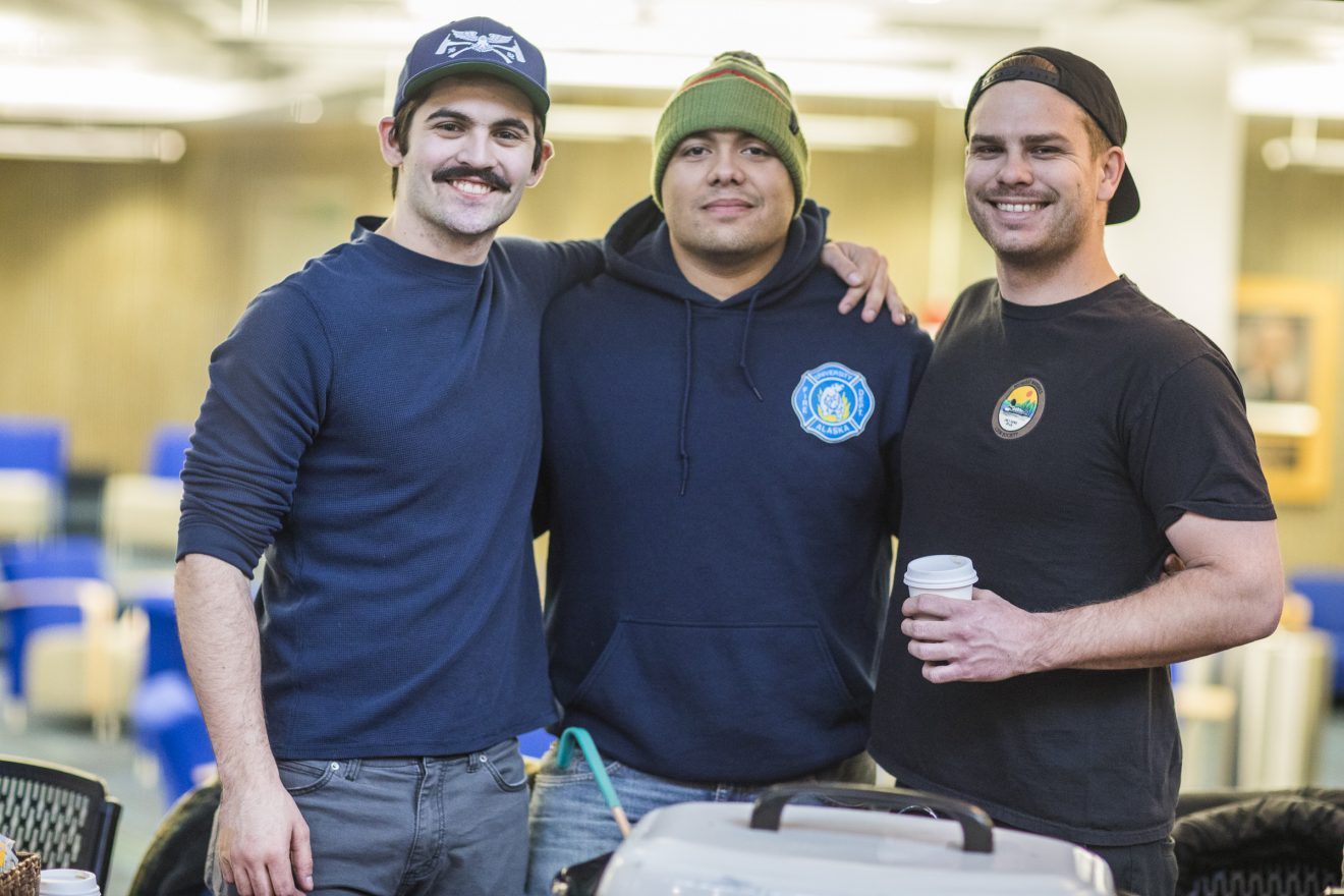 University Fire Department students, from left, Jonathon Thompson, Lorenzo Mendoza, Landon Bell, gather for a photo during this year's Chilli Cook-Off, a fundraiser benefiting the United Way of the Tanana Valley last Thursday. UFD won this year's best chilli.
