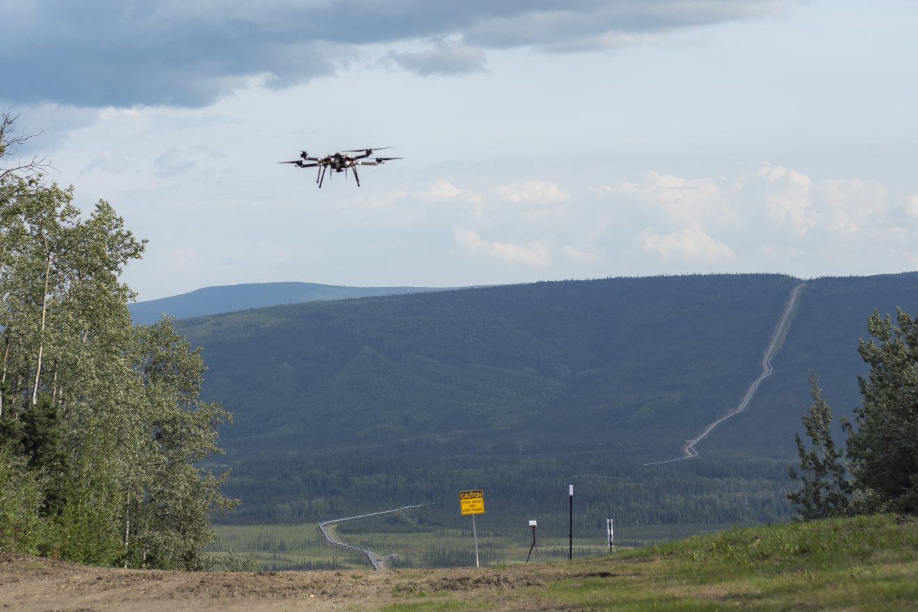 Unmanned aircraft flying over the pipeline.