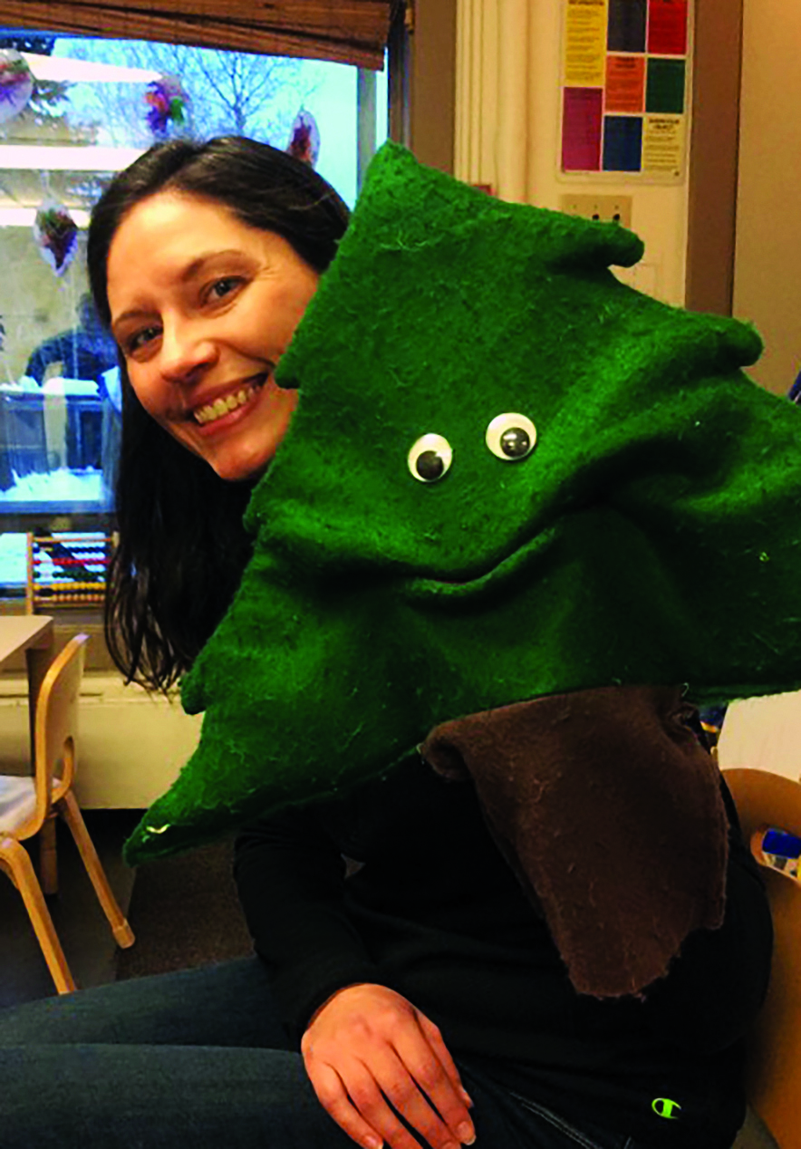 Kelly Kealy and her teaching assistant, “Mr. Tree.” Kealy and fellow UAF graduate student Maggie Blake worked with children at UAF’s Bunnell House. Photo courtesy Kelly Kealy