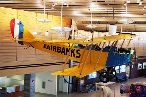 Ben Eielson's Curtiss JN-4D “Jenny” airplane on display at the Fairbanks International Airport. UAMN photo by Theresa Bakker.