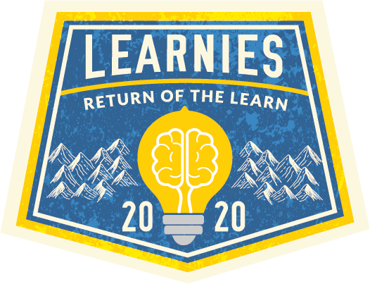 Learnies badge with lightbulb in front of mountains.