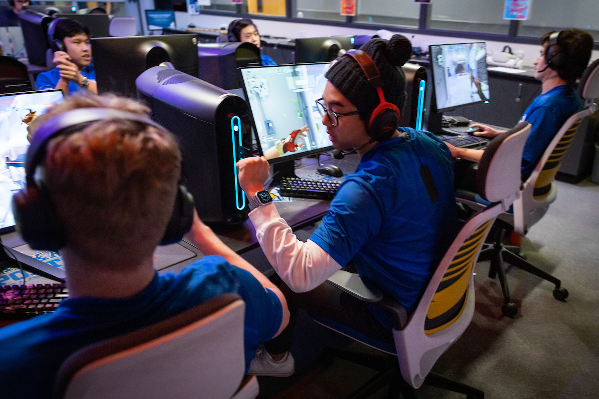 Two students at a gaming PC in the Esports center