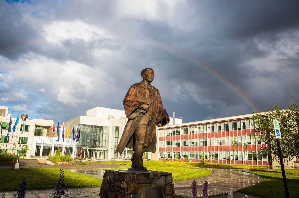 Bartlett statue with rainbow