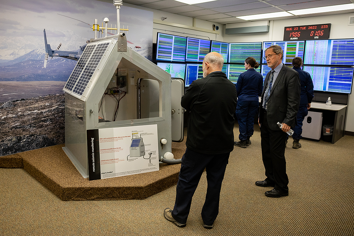 Bob McCoy, Director of the Geophysical Institute, shows a seismic monitoring station to the Head Adminstrator of NOAA, Dr. Richard W. Spinrad. UAF Photo by Leif Van Cise.