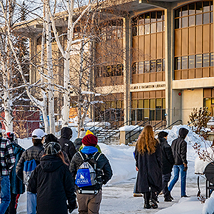 New Student Orientation, Spring, heading towards Elmer E. Rasmuson Library. UAF photo by Leif Van Cise.