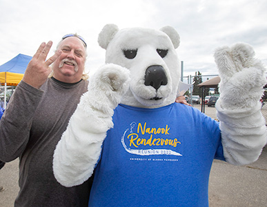 John Knoke ’92 of Florida celebrates the 30th anniversary of his graduation at the Alaska Goldpanners’ Nanook night during the 2022 Nanook Rendezvous alumni reunion. UAF photo by Eric Engman.