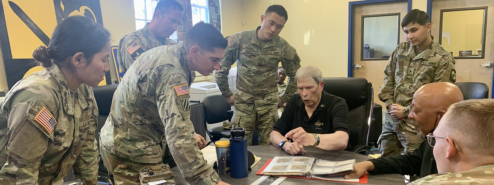 Paul Hunter ’62 meets with Army ROTC students and staff during a visit to campus as part of the 2022 Nanook Rendezvous alumni reunion