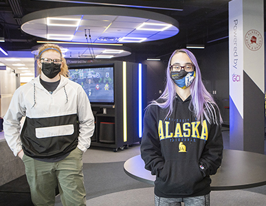 Students wearing masks at the Alaska Esports room