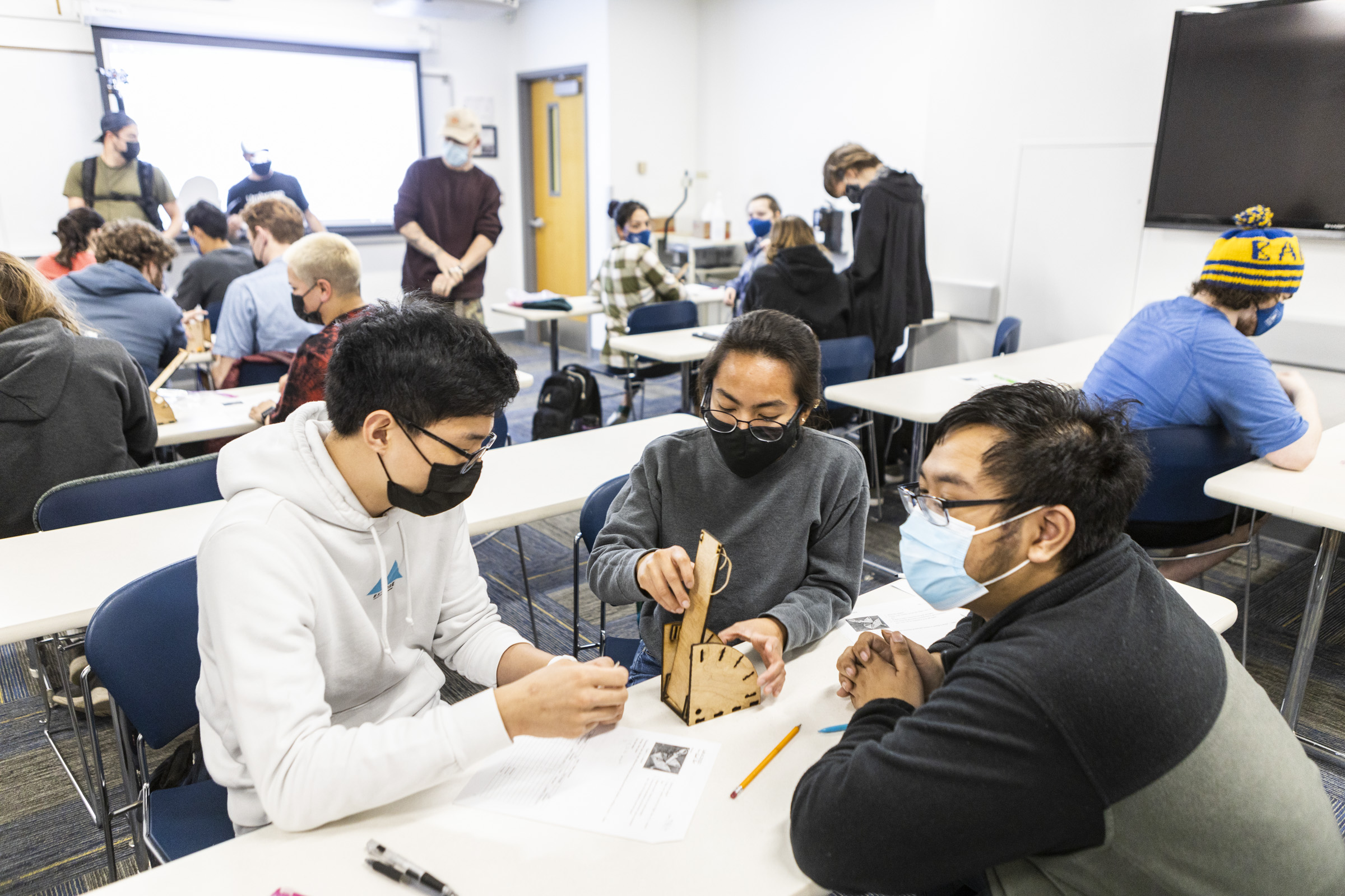 College of Engineering and Mines students build a catapult during an Introduction to Engineering class at the Duckering Building in September 2021. UAF photo by JR Ancheta.