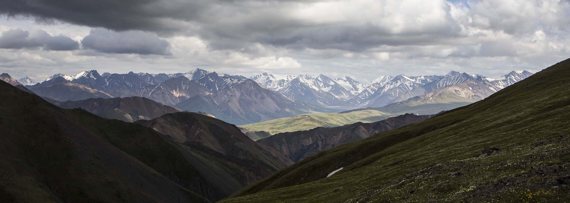 Low-hanging clouds over the Alaska Mountain Range.