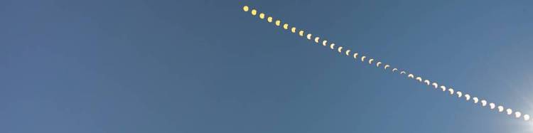 A timelapse photo of a partial solar eclipse.