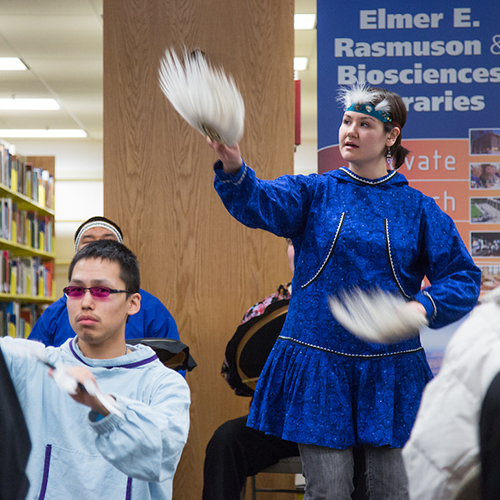Naaqtuuq Dommek of the UAF Iñu-Yupiaq Dance Group performs during the dedication ceremony of the Michael E. Krauss Alaska Native Language Archive Feb. 22, 2013, at the Rasmuson Library. | UAF Photo by JR Ancheta