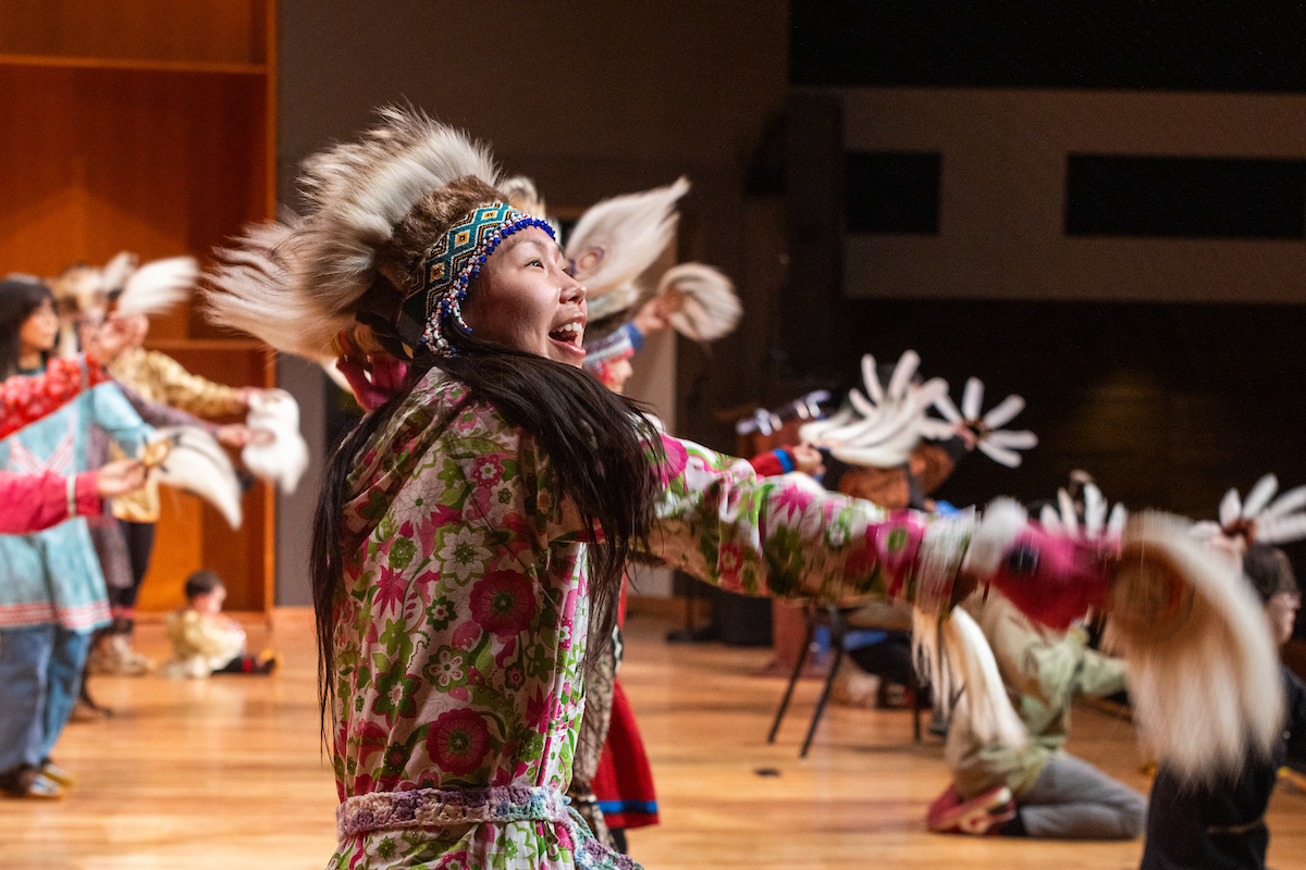 Cheri Alstrom of St. Mary's dances with the Acilquq Dance Group during the 50th annual Festival of Native Arts Friday, February 23, 2024. UAF Photo by Eric Engman