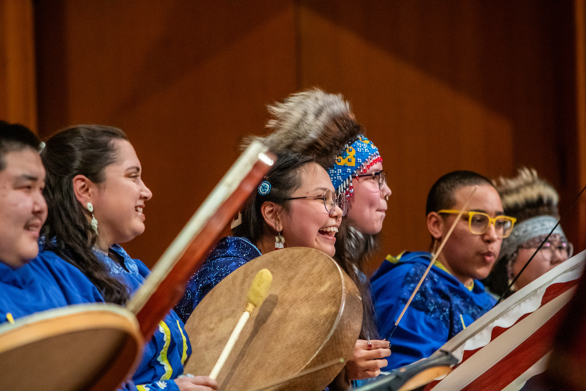 Inu-Yupiaq group performs at the 50th Festival of Native Arts day one in the Davis Concert on Thursday, February 22, 2024. UAF Photo by Marina Santos