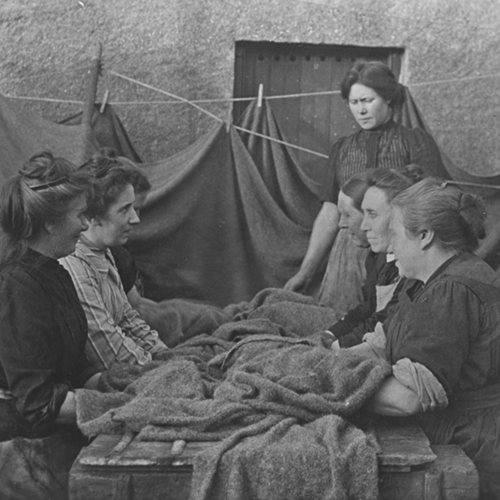 A group of women shrinking tweed by beating, 1920s © Highland Folk Museum