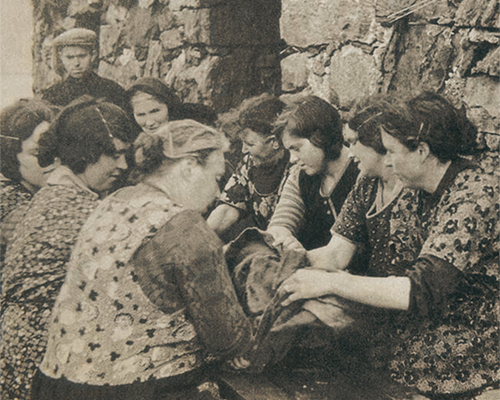 A group of women in Scotland sing songs in Gaelic while waulking | Image courtesy of the Harris Tweed Authority