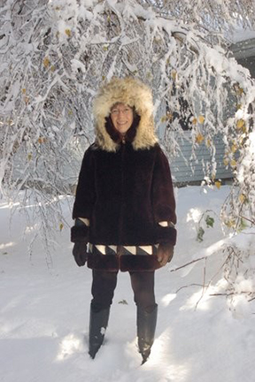 Catherine Madsen poses in the snow in her vintage Alaskan parka | Photo by Joseph Boucher