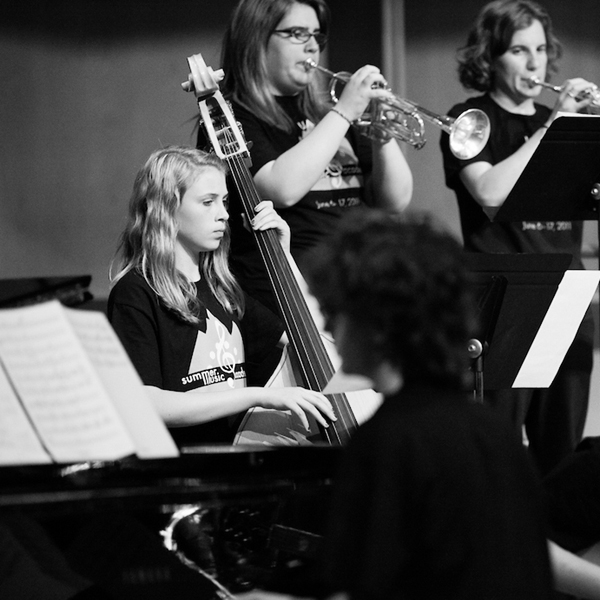 A Summer Music Academy string bass player on stage. UAF Photo