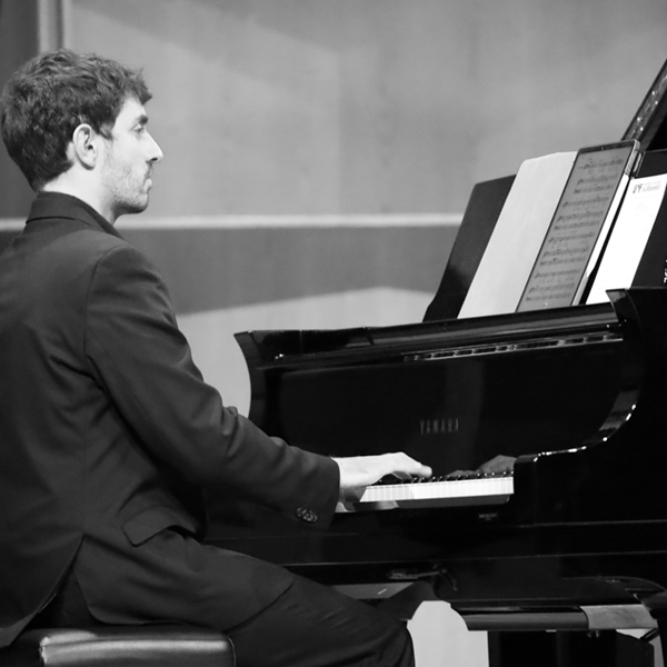 Dario Martin plays the piano. UAF Photo by Jaunelle Celaire