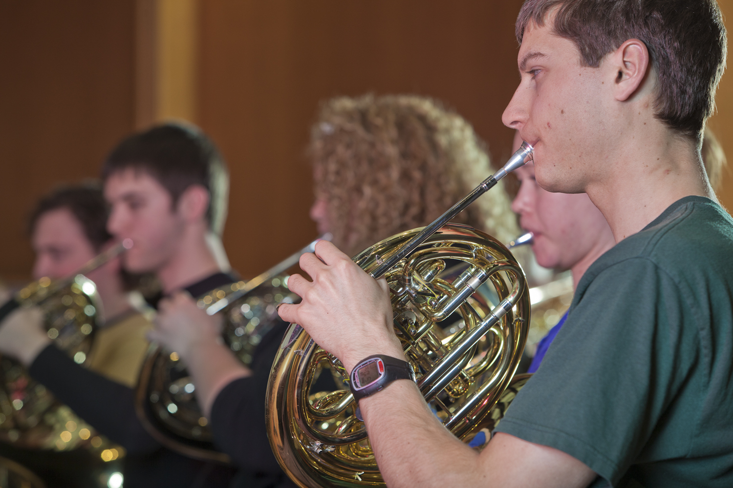 The french horn section of the UAF Wind Ensemble rehearses in the Charles Davis Concert Hall. UAF Photo by Todd Paris