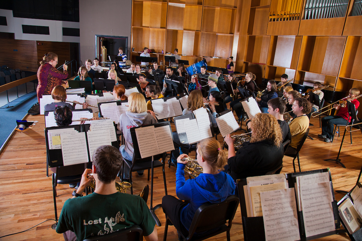 Assistant professor Karen Gustafson directs the UAF Wind Ensemble during rehearsal in the Davis Concert Hall. UAF Photo by Todd Paris