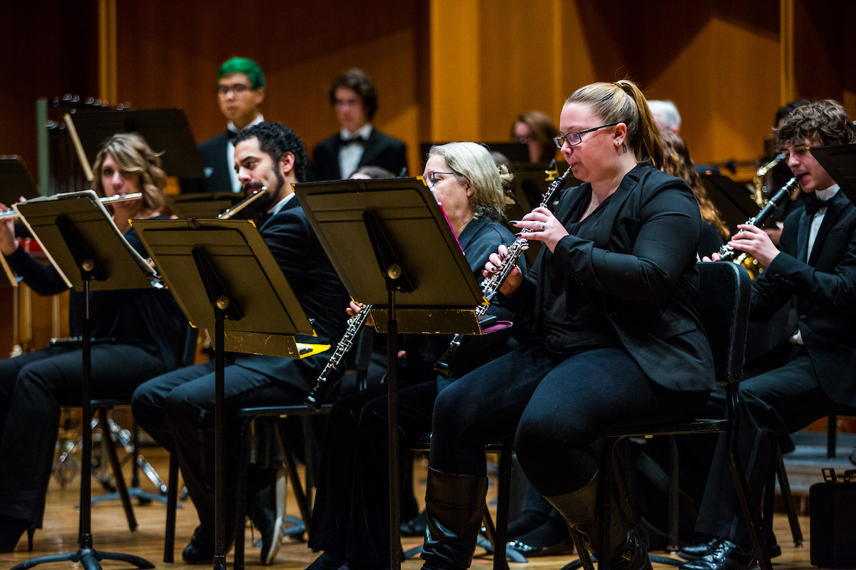 Members of the UAF Wind Symphony warm up prior to their concert on Nov. 18, 2016. UAF Photo by Zayn Roohi